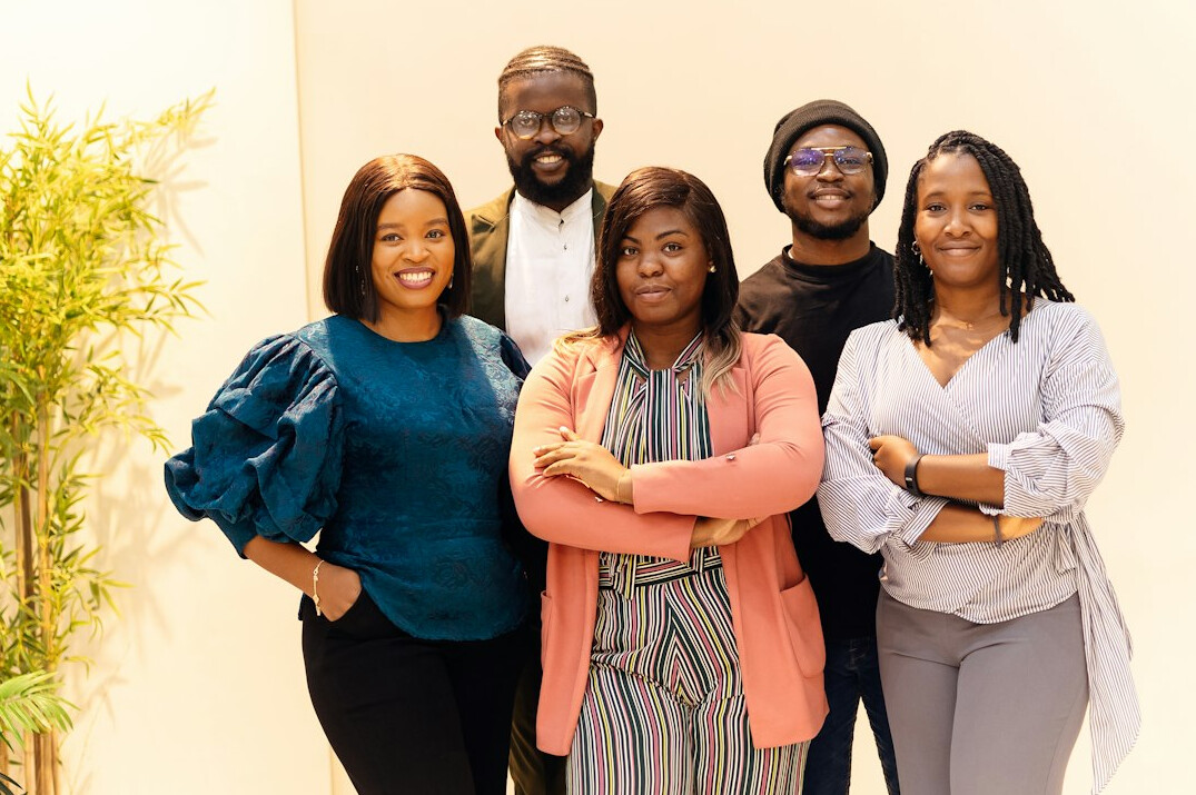 diverse team smiling together